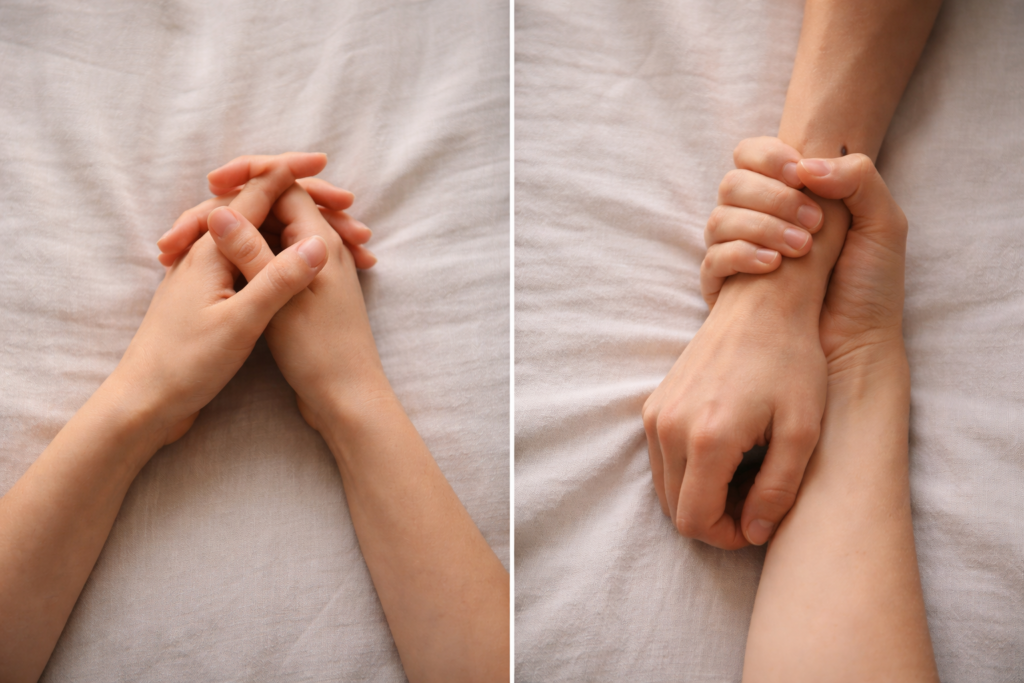Differenza tra amore e dipendenza affettiva: mani che si tengono con delicatezza e mano che stringe il polso dell’altra con forza